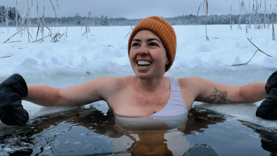 WHM Retreat - woman in icebath in frozen lake